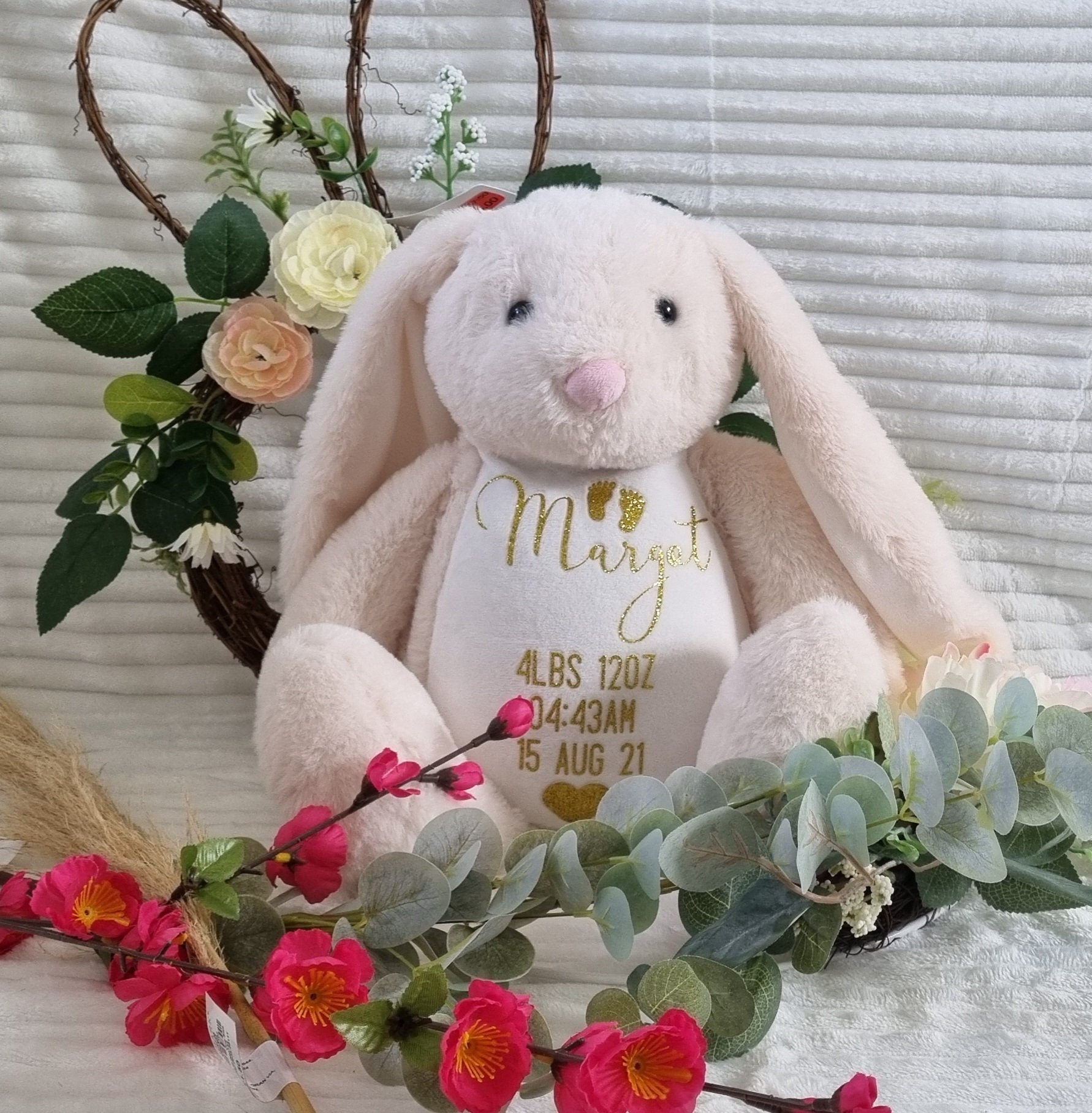 Golden Stitch cream bunny with embroidered birth weight heirloom design