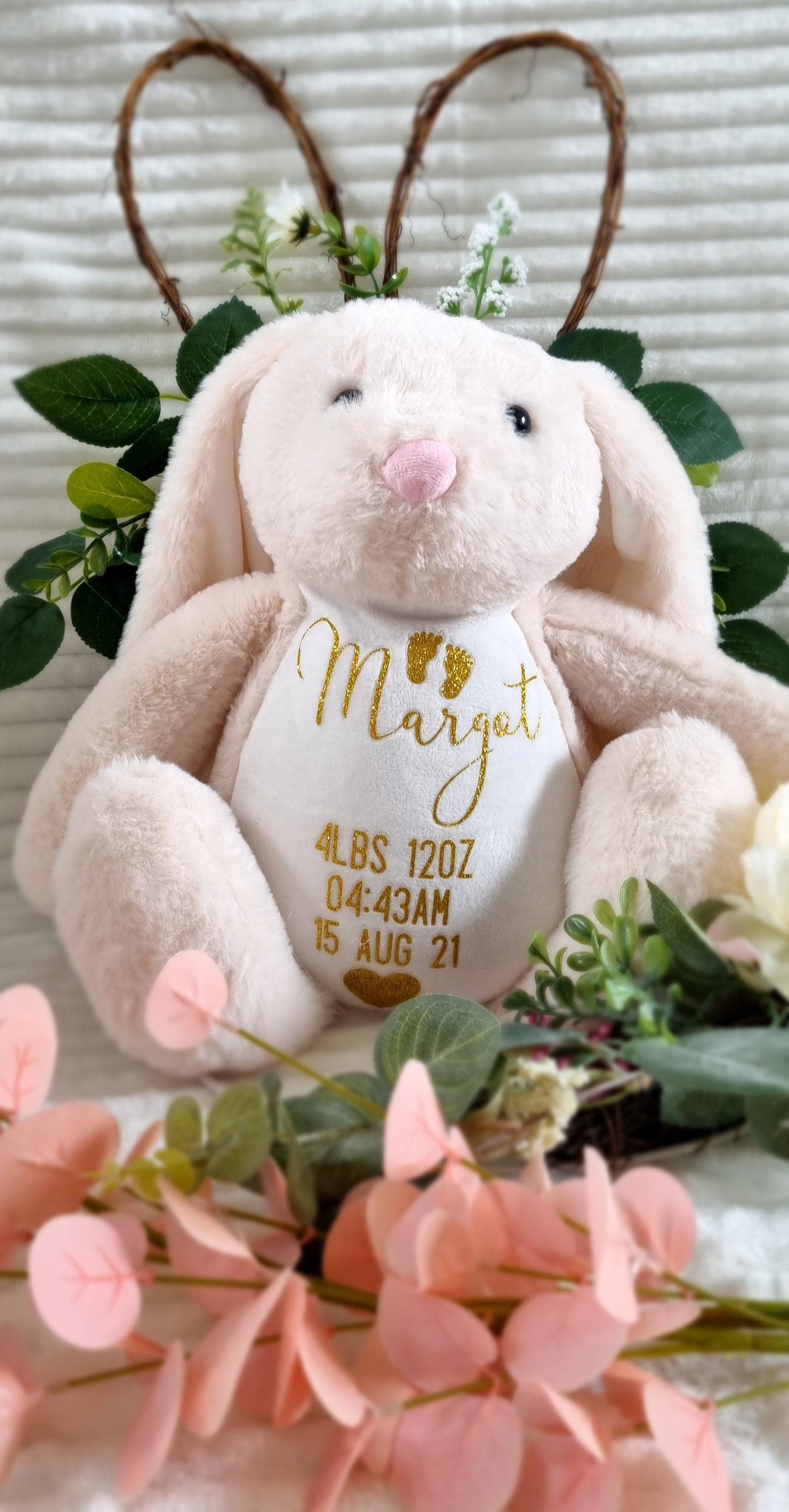 Personalized cream bunny birth weight heirloom plush with pink belly embroidery