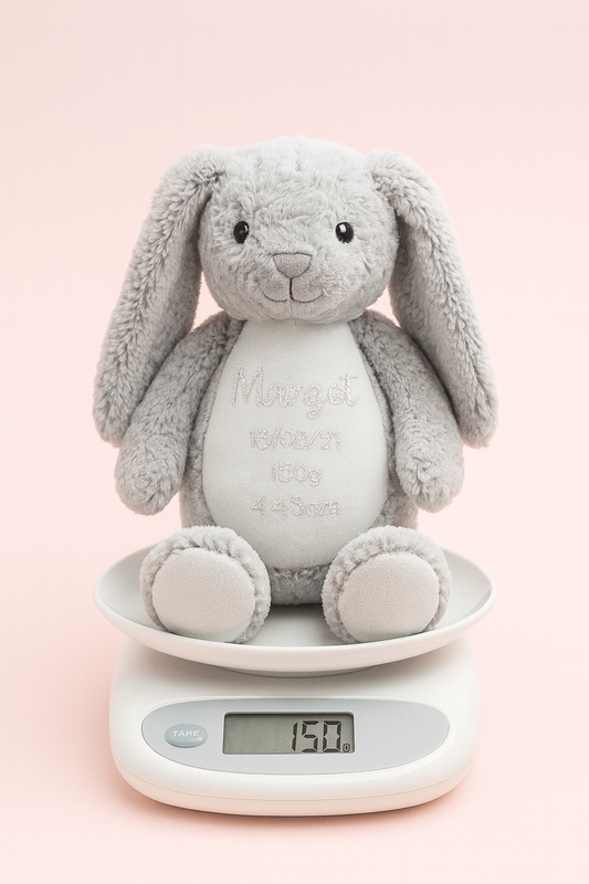Grey bunny exact birth weight keepsake on white scale